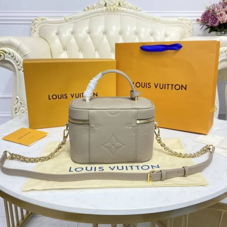 Louis vuitton locations Microfibr LV Monogram Empreinte Leather Vanity PM Dune