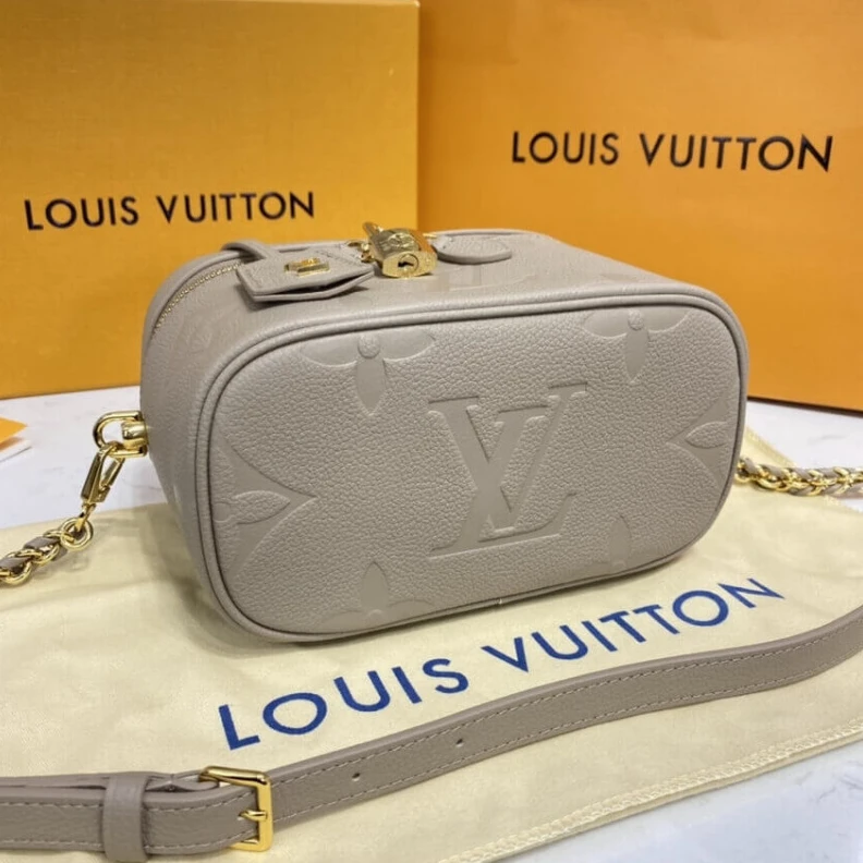 Louis vuitton locations Microfibr LV Monogram Empreinte Leather Vanity PM Dune