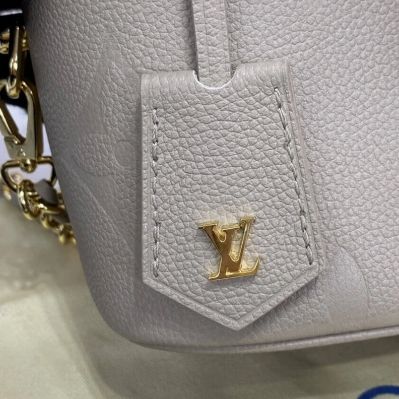 Louis vuitton locations Microfibr LV Monogram Empreinte Leather Vanity PM Dune