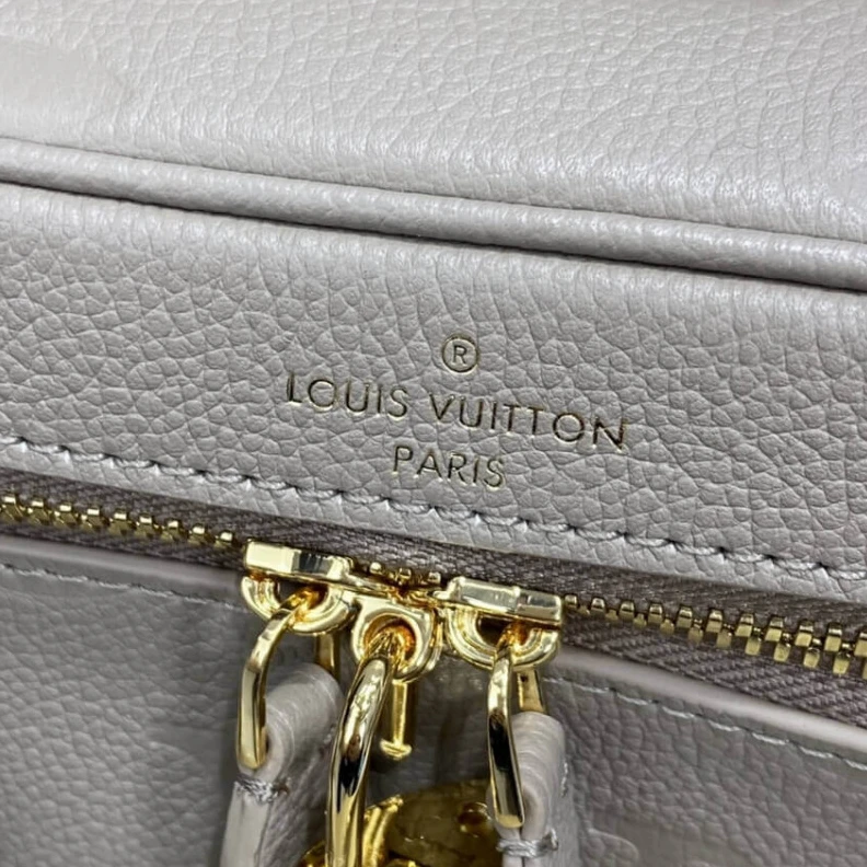 Louis vuitton locations Microfibr LV Monogram Empreinte Leather Vanity PM Dune