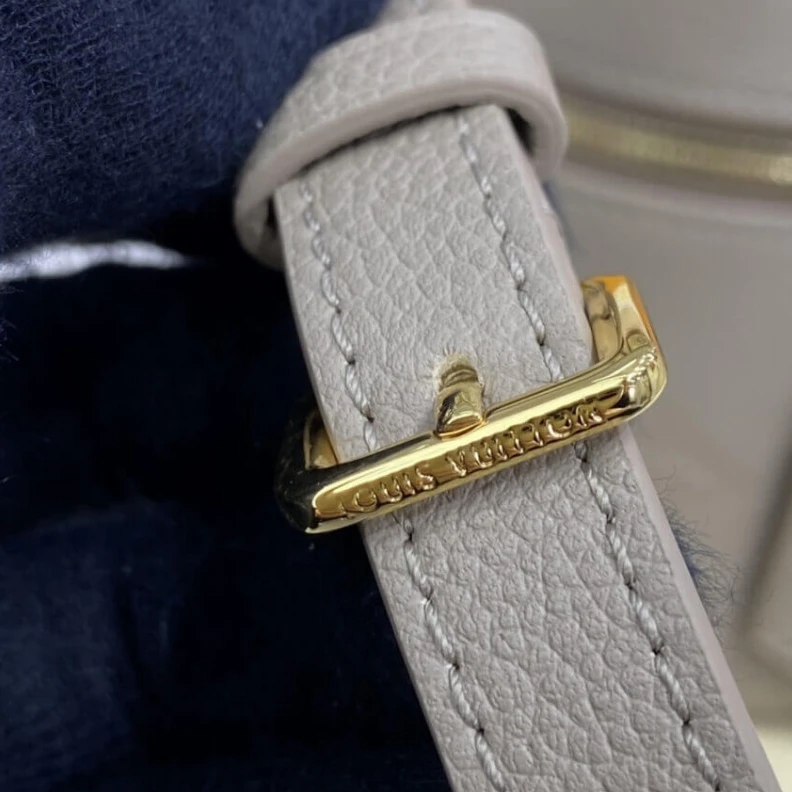 Louis vuitton locations Microfibr LV Monogram Empreinte Leather Vanity PM Dune