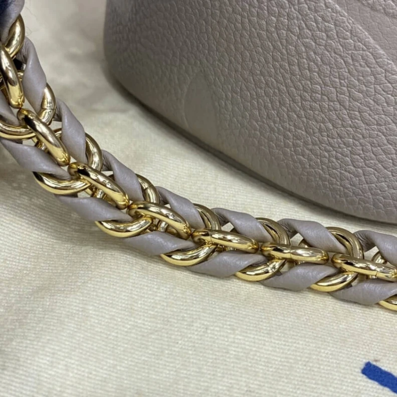 Louis vuitton locations Microfibr LV Monogram Empreinte Leather Vanity PM Dune