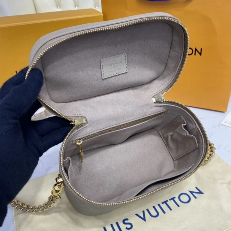 Louis vuitton locations Microfibr LV Monogram Empreinte Leather Vanity PM Dune