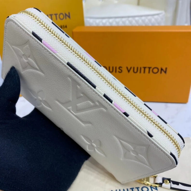 Mythick ru Louis Vuitton Monogram Empreinte Leather with Animal-Print Zippy Wallet Cream