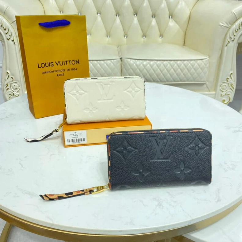 Mythick ru Louis Vuitton Monogram Empreinte Leather with Animal-Print Zippy Wallet Cream