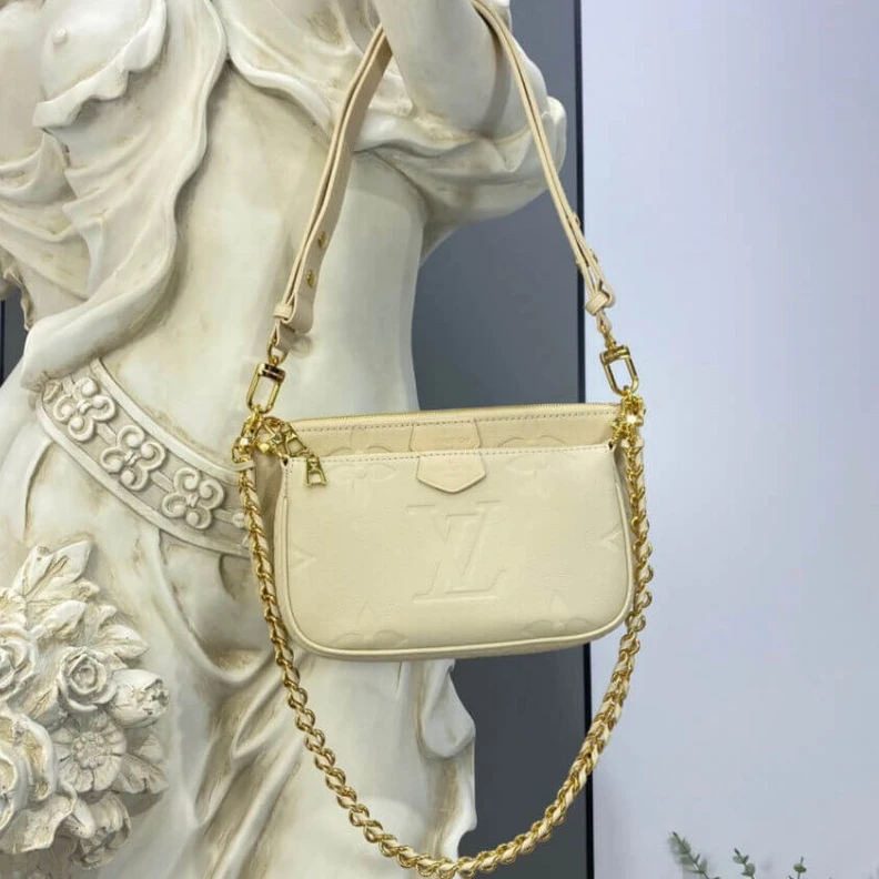 Replica bag Chain dro Louis Vuitton Monogram Empreinte Multi Pochette Accessoires Cream