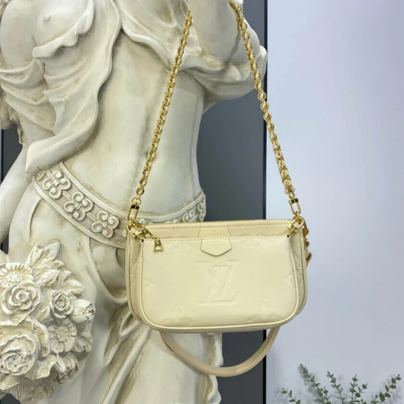 Replica bag Chain dro Louis Vuitton Monogram Empreinte Multi Pochette Accessoires Cream