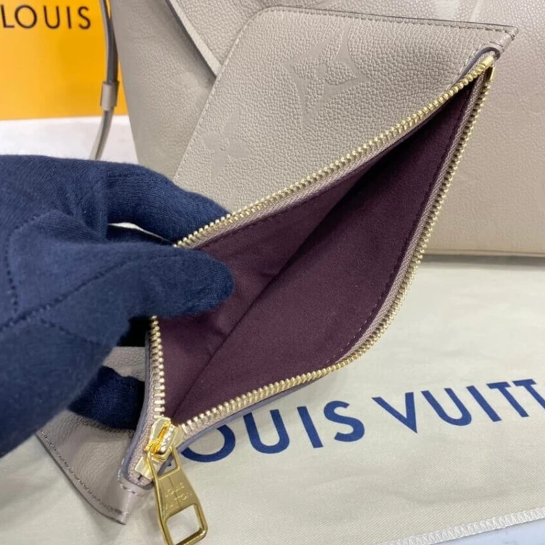 Top lv 4 side la Louis Vuitton Monogram Empreinte Neverfull MM Dune