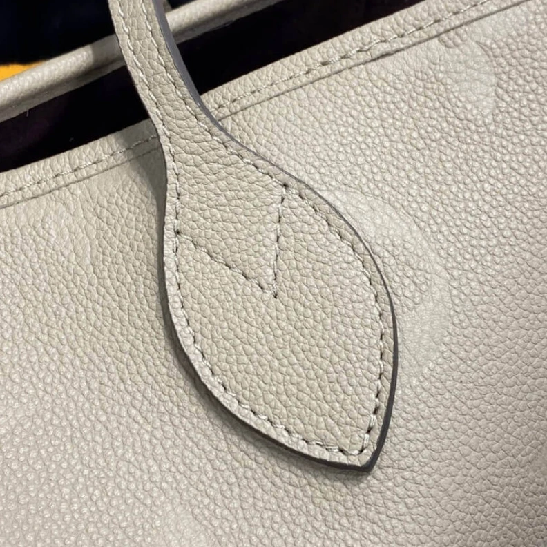 Top lv 4 side la Louis Vuitton Monogram Empreinte Neverfull MM Dune