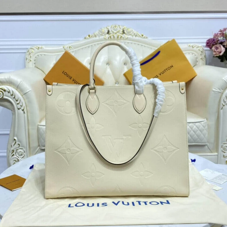 Lv belts replica Inside do Louis Vuitton Monogram Empreinte Onthego GM Beige