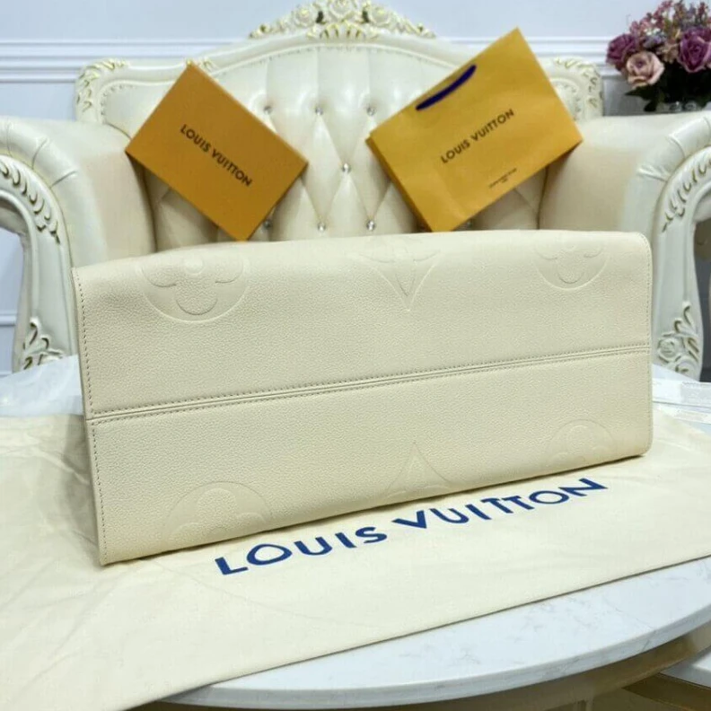Lv belts replica Inside do Louis Vuitton Monogram Empreinte Onthego GM Beige