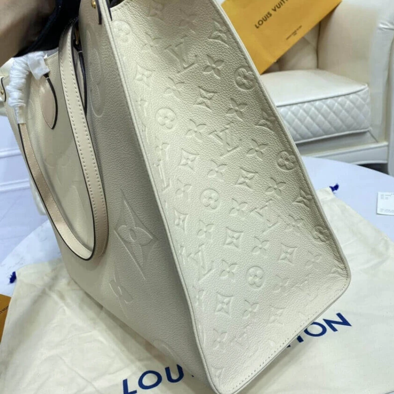 Lv belts replica Inside do Louis Vuitton Monogram Empreinte Onthego GM Beige
