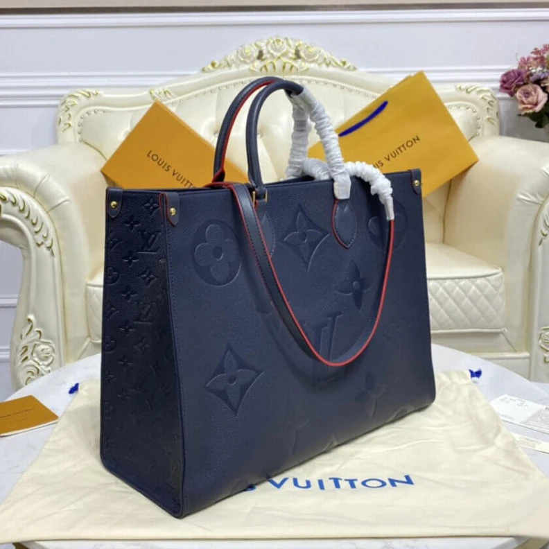 Lv belts replica The stylis Louis Vuitton Monogram Empreinte Onthego GM Blue