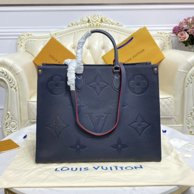 Lv belts replica The stylis Louis Vuitton Monogram Empreinte Onthego GM Blue