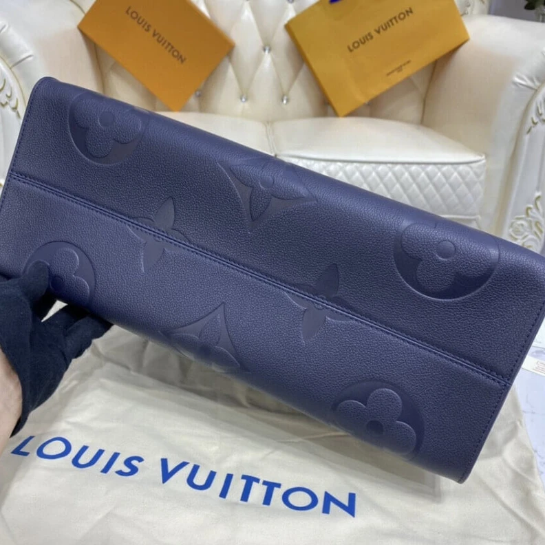 Lv belts replica The stylis Louis Vuitton Monogram Empreinte Onthego GM Blue