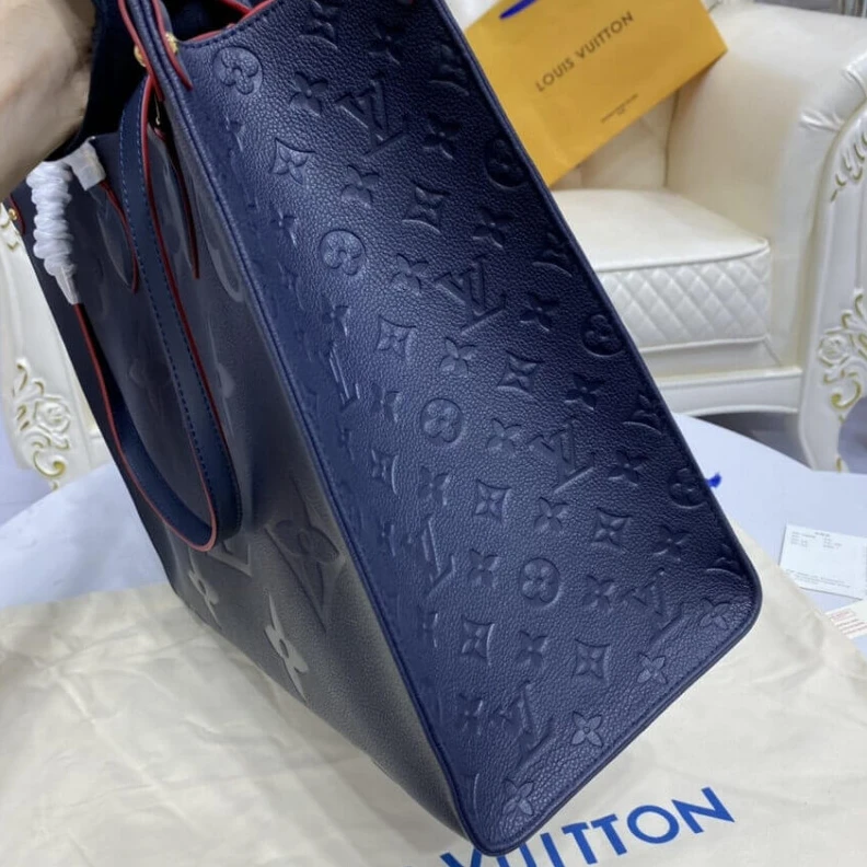 Lv belts replica The stylis Louis Vuitton Monogram Empreinte Onthego GM Blue