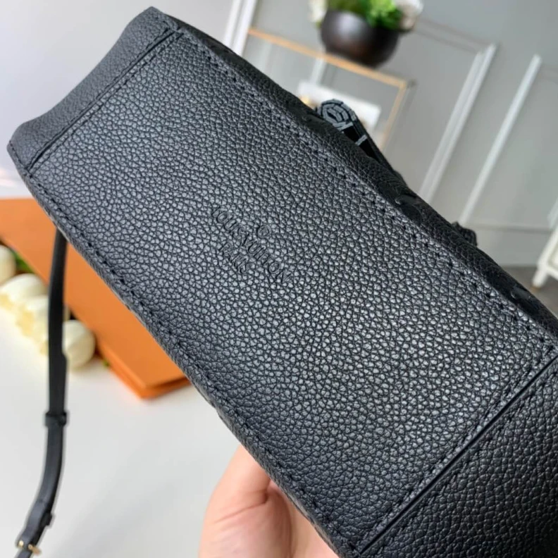 Replica bags Supple gr LV Monogram Empreinte Saintonge Bag
