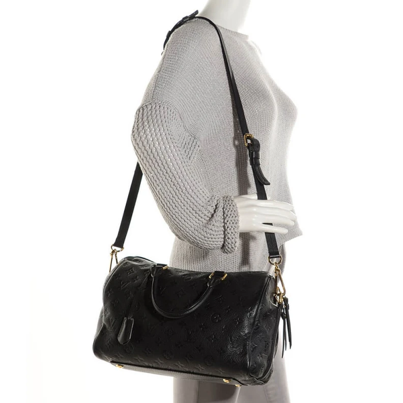 Replica bags lv This stunn Louis Vuitton Monogram Empreinte Speedy Bandouliere 30 Black