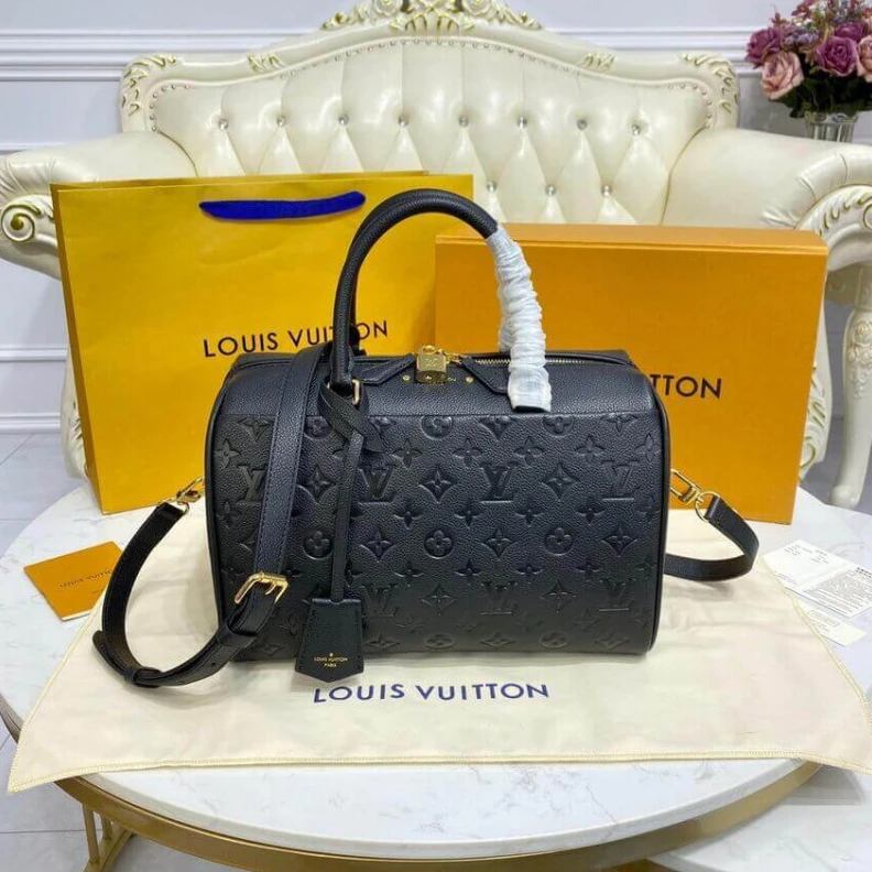 Replica bags lv This stunn Louis Vuitton Monogram Empreinte Speedy Bandouliere 30 Black