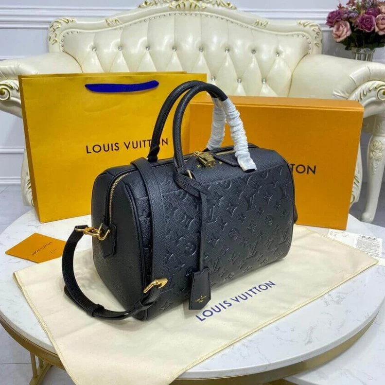 Replica bags lv This stunn Louis Vuitton Monogram Empreinte Speedy Bandouliere 30 Black