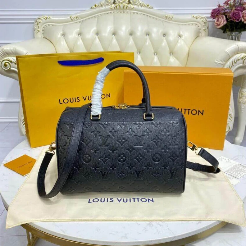 Replica bags lv This stunn Louis Vuitton Monogram Empreinte Speedy Bandouliere 30 Black