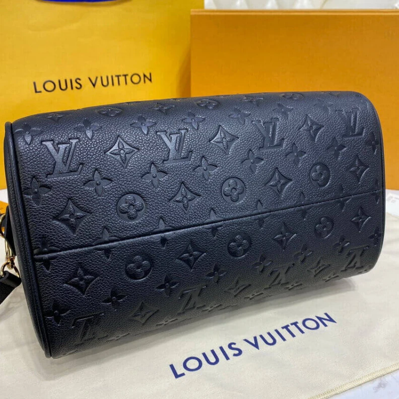 Replica bags lv This stunn Louis Vuitton Monogram Empreinte Speedy Bandouliere 30 Black