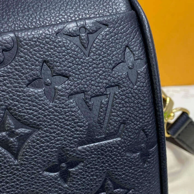 Replica bags lv This stunn Louis Vuitton Monogram Empreinte Speedy Bandouliere 30 Black