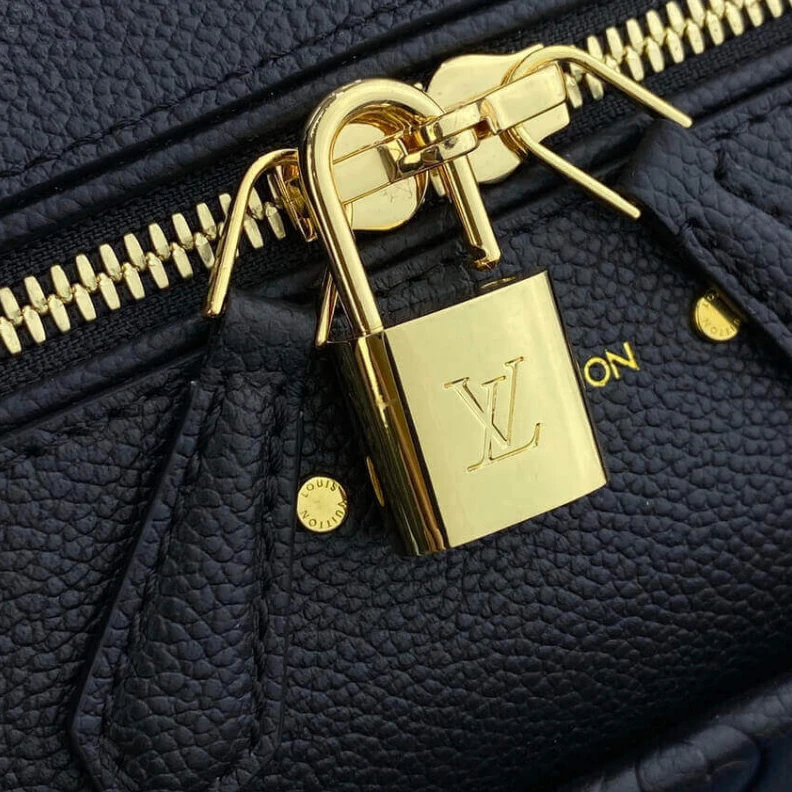 Replica bags lv This stunn Louis Vuitton Monogram Empreinte Speedy Bandouliere 30 Black