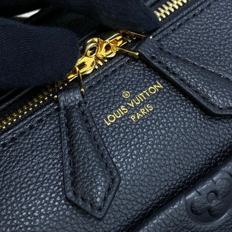 Replica bags lv This stunn Louis Vuitton Monogram Empreinte Speedy Bandouliere 30 Black
