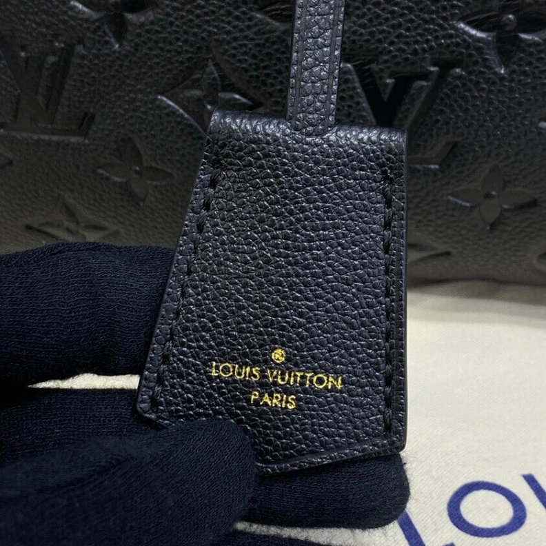 Replica bags lv This stunn Louis Vuitton Monogram Empreinte Speedy Bandouliere 30 Black
