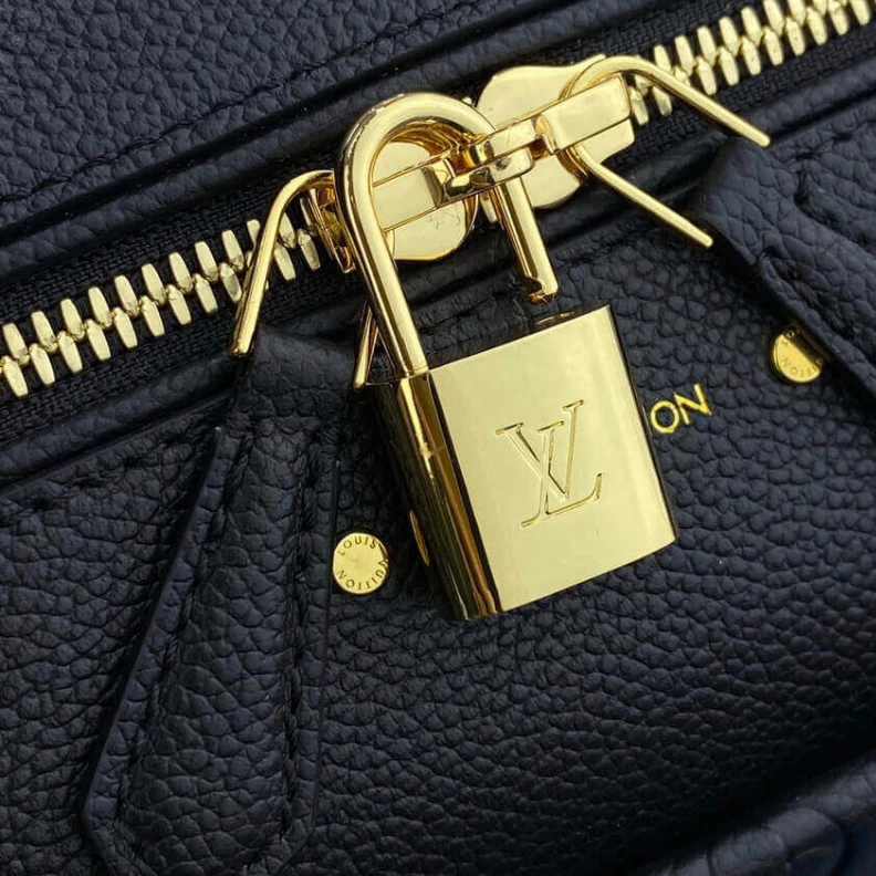 Replica bags lv This stunn Louis Vuitton Monogram Empreinte Speedy Bandouliere 30 Black