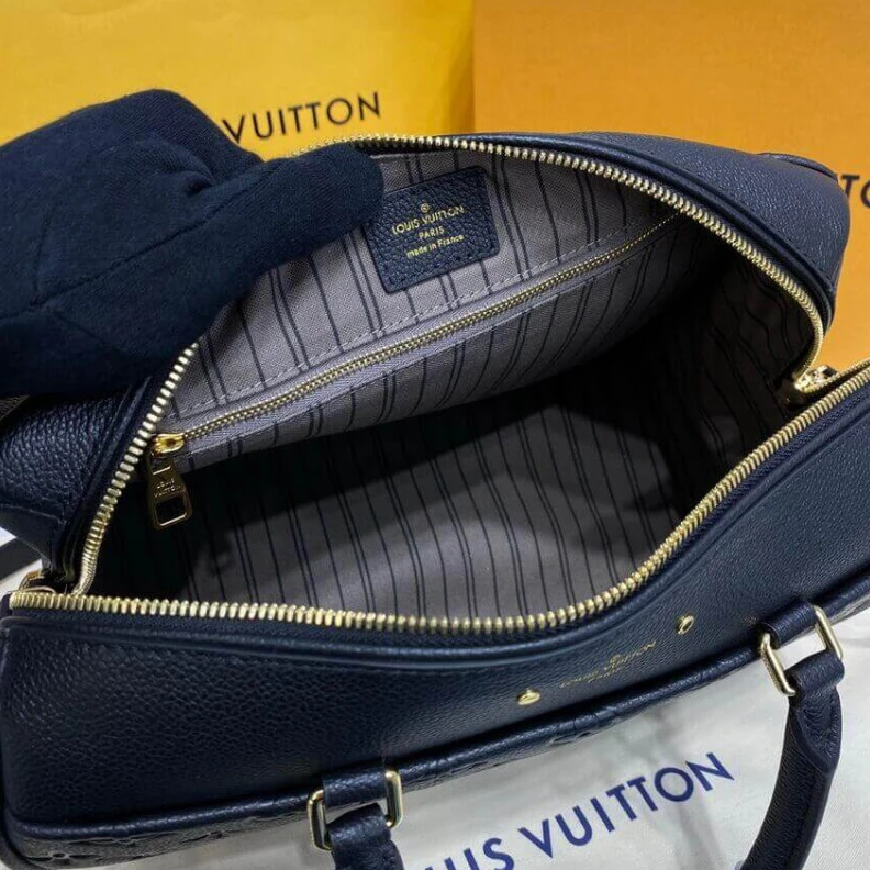 Replica bags lv This stunn Louis Vuitton Monogram Empreinte Speedy Bandouliere 30 Black