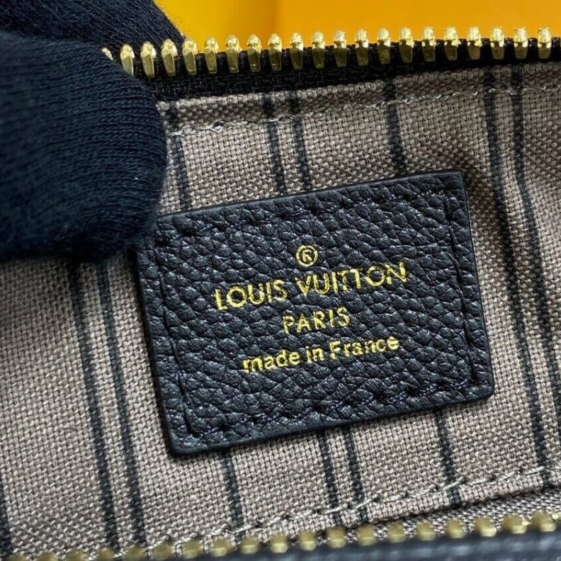 Replica bags lv This stunn Louis Vuitton Monogram Empreinte Speedy Bandouliere 30 Black