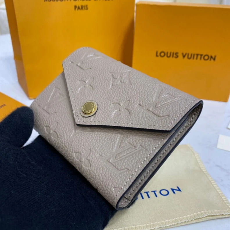 Replica bags lv Tourterel Louis Vuitton Monogram Empreinte Victorine Wallet Tourterelle