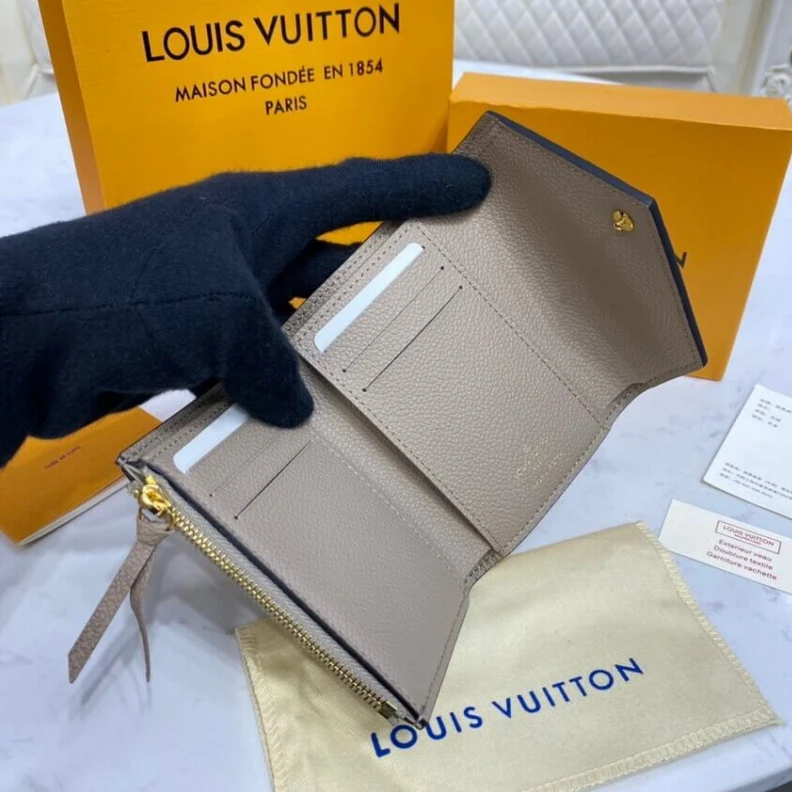 Replica bags lv Tourterel Louis Vuitton Monogram Empreinte Victorine Wallet Tourterelle