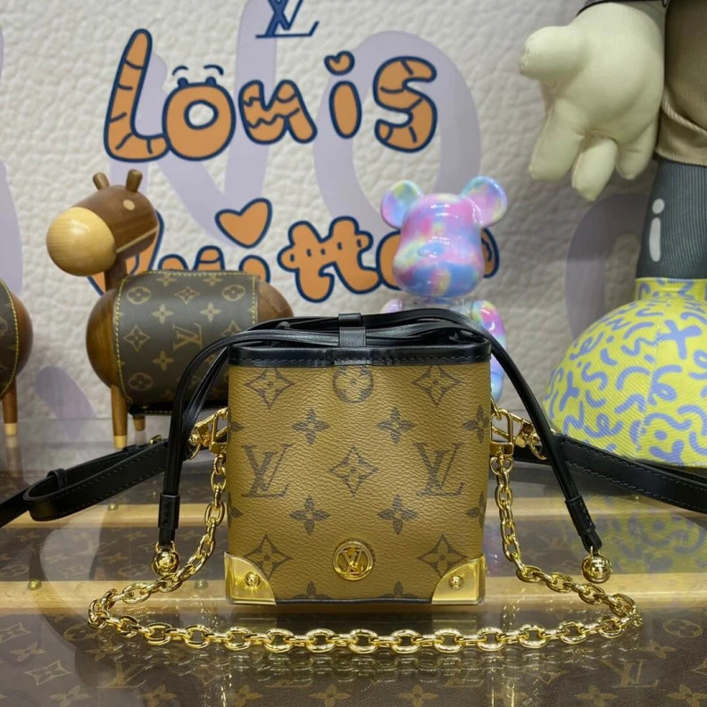 Replica bag Trunk sty Louis Vuitton Monogram Reverse Canvas Noe Purse