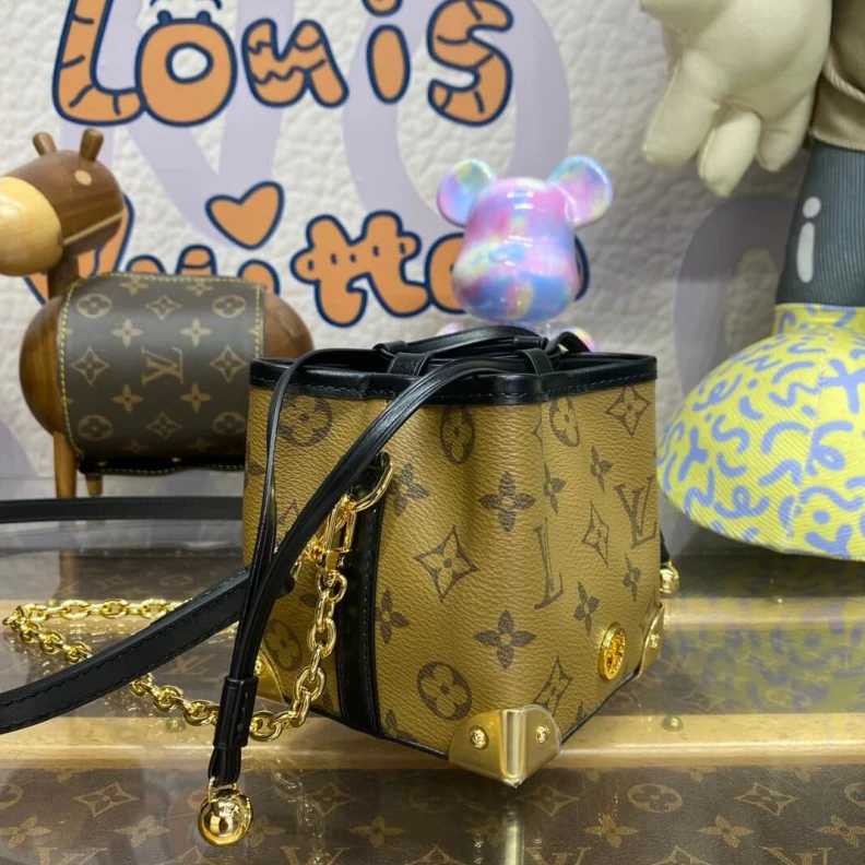 Replica bag Trunk sty Louis Vuitton Monogram Reverse Canvas Noe Purse
