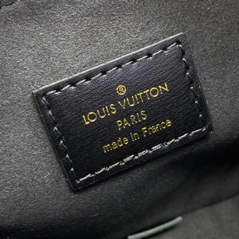 Replica bag Trunk sty Louis Vuitton Monogram Reverse Canvas Noe Purse