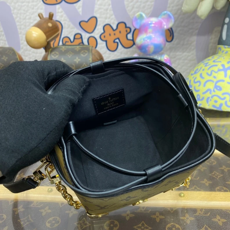 Replica bag Trunk sty Louis Vuitton Monogram Reverse Canvas Noe Purse