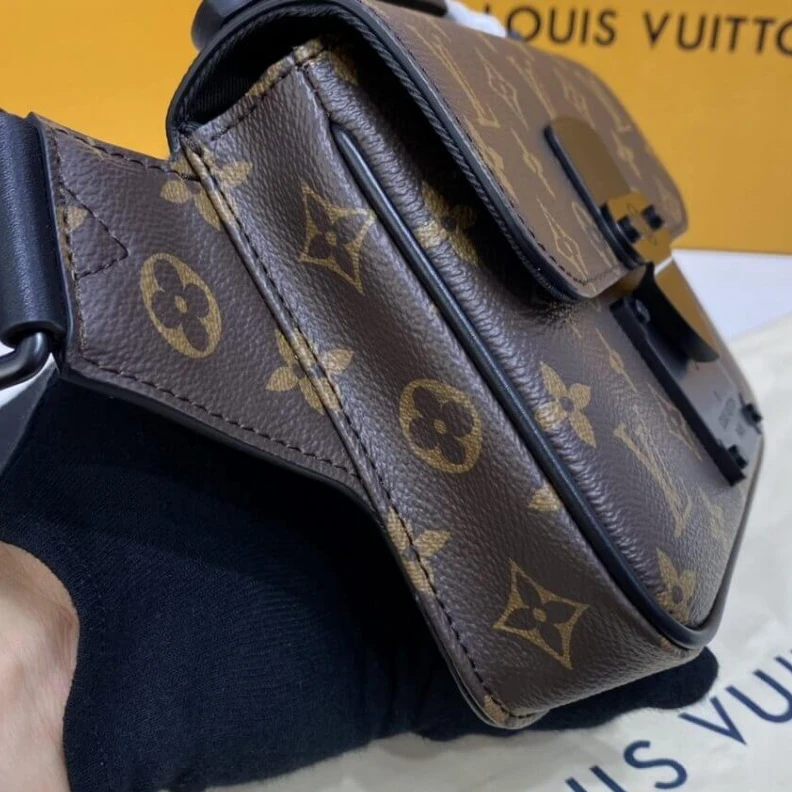 Louis vuitton locations Strap Dro Louis Vuitton Monogram S Lock Sling Bag