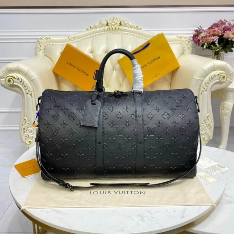 Handle:Si Louis Vuitton Monogram Seal Keepall Bandoulière 50 Black