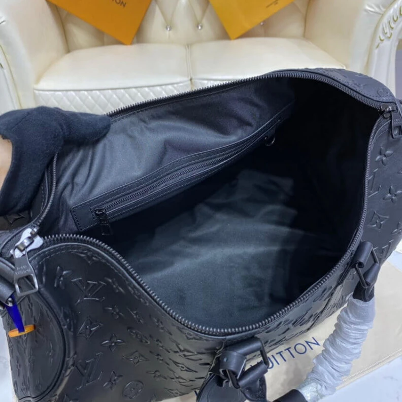 Replica bag Handle:Si Louis Vuitton Monogram Seal Keepall Bandoulière 50 Black