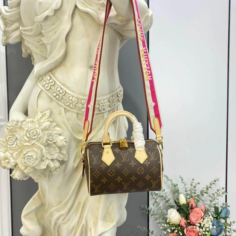 Replica bags Louis Vuitton Monogram Speedy Bandouliere 20 Fuchsia