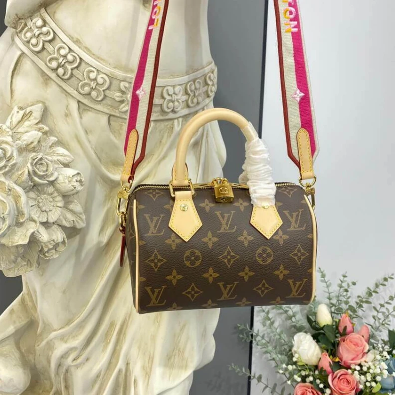 Replica bags Louis Vuitton Monogram Speedy Bandouliere 20 Fuchsia