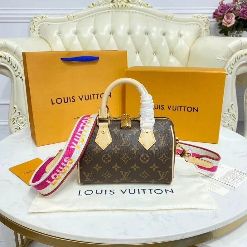 Replica bags Louis Vuitton Monogram Speedy Bandouliere 20 Fuchsia