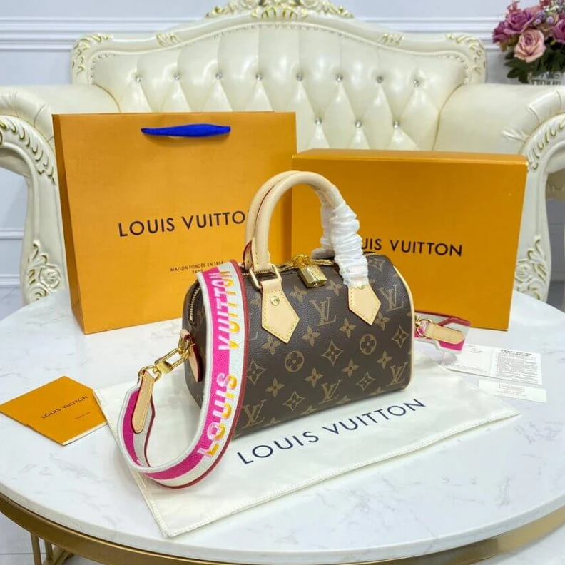 Replica bags Louis Vuitton Monogram Speedy Bandouliere 20 Fuchsia