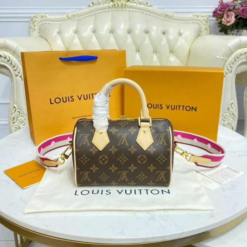 Replica bags Louis Vuitton Monogram Speedy Bandouliere 20 Fuchsia