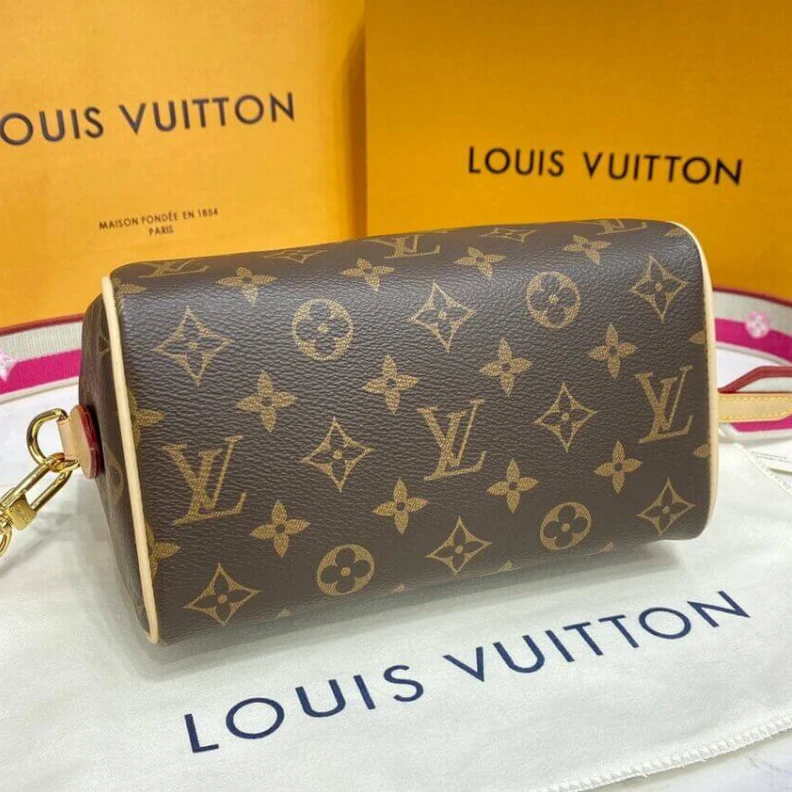 Replica bags Louis Vuitton Monogram Speedy Bandouliere 20 Fuchsia