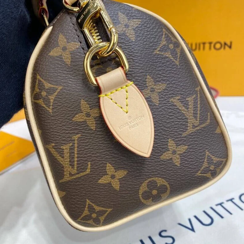 Replica bags Louis Vuitton Monogram Speedy Bandouliere 20 Fuchsia