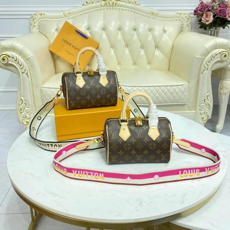 Replica bags Louis Vuitton Monogram Speedy Bandouliere 20 Fuchsia